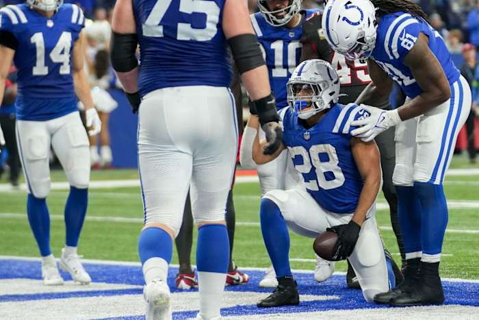 Indianapolis Colts running back Jonathan Taylor (28) scores a touchdown Sunday, Nov. 26, 2023, during a game against the Tampa Bay Buccaneers at Lucas Oil Stadium in Indianapolis.